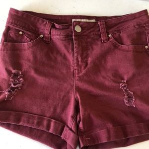 Royalty for me, maroon shorts.